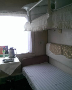 An example of a typical soft sleeper carriage often seen in Chinese sleeper trains)