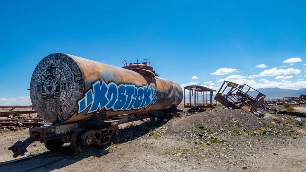 Train carcass with graffiti at Bolivia's Train Graveyard